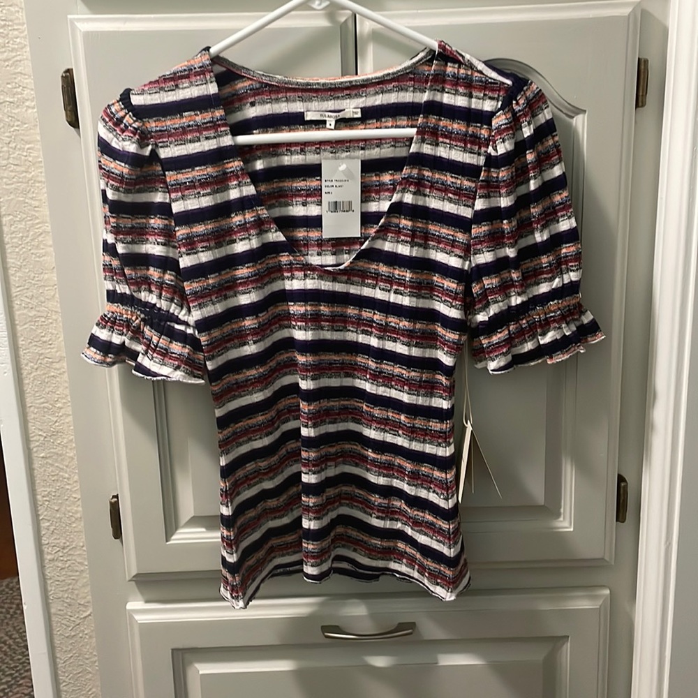 Tularosa puff sleeves. Plunge neck top